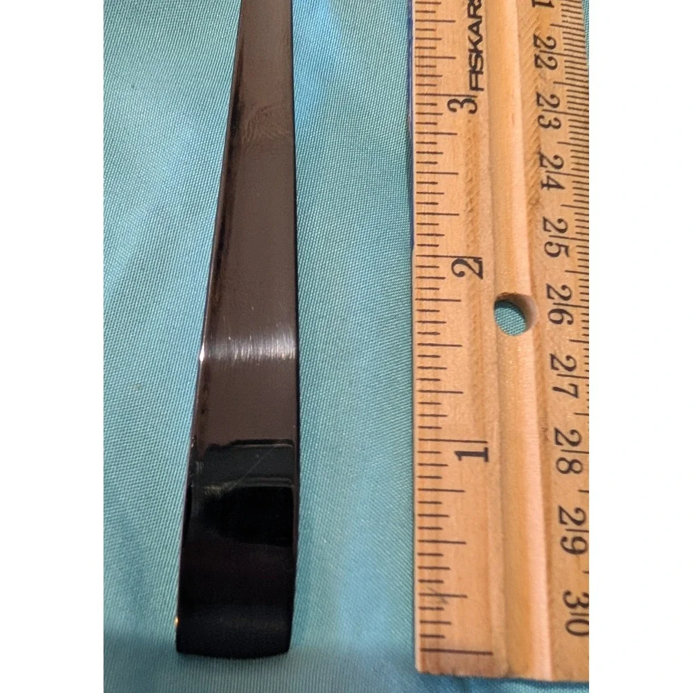 8 larger Black Spoons 7